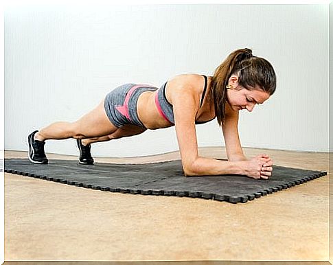 Girl performs plank