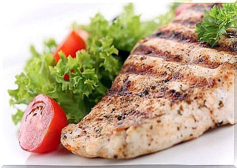 Grilled fish fillet and salad