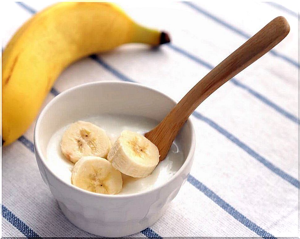 Small bowl with banana slices and yogurt