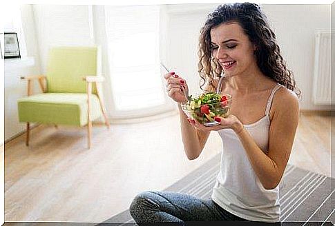 Woman eating a salad