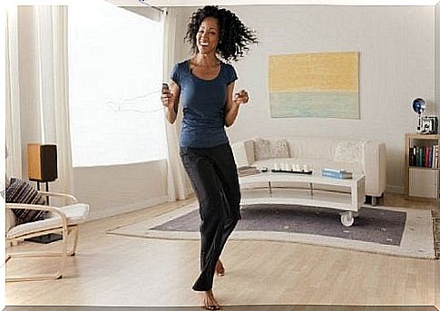 Woman dancing at home