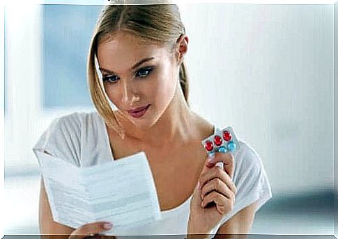 Woman reading a leaflet.