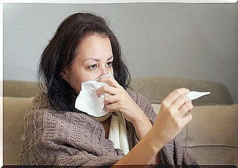 Woman measuring fever.