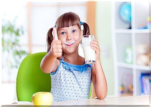 Little girl drinking milk