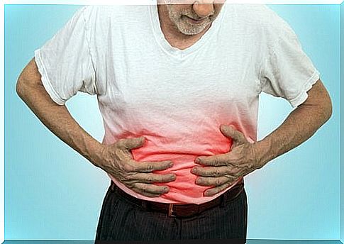 Man with white shirt colored red at the belly to symbolize ulcer