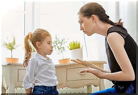 Mother talking to her daughter