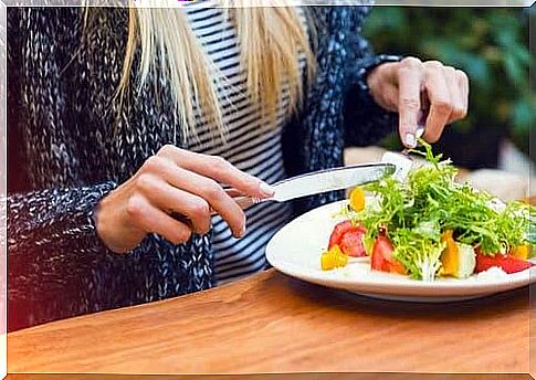 Girl eating a salad