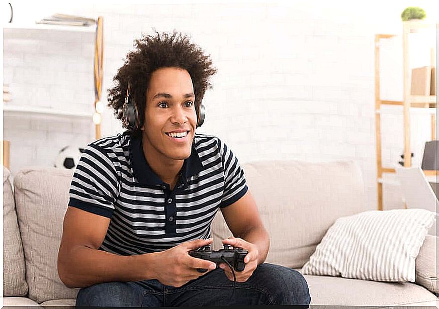 Teenager with playstation